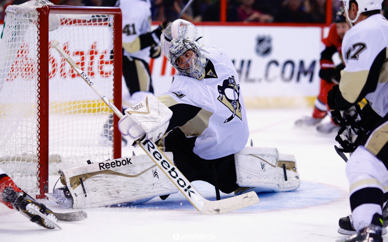 OTTAWA, CANADA - December 23 : Pittsburgh Penguins Goalie Marc-Andre Fleury (29) [3395] with a big toe save during a game between the Penguins and Senators at Canadian Tire Centre on December 23, 2013 in Ottawa, Ontario, Canada. ***** Editorial Use Only *****Jay Kopinski-Icon/SMI