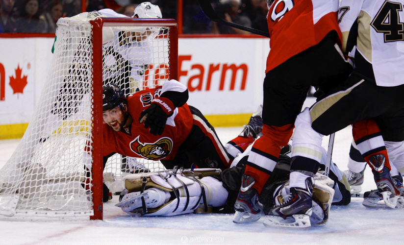 OTTAWA, CANADA - December 23 : Ottawa Senators Left Wing Cory Conacher (89) [8609] scores as he goes into the net during a game between the Penguins and Senators at Canadian Tire Centre on December 23, 2013 in Ottawa, Ontario, Canada. ***** Editorial Use Only *****Jay Kopinski-Icon/SMI