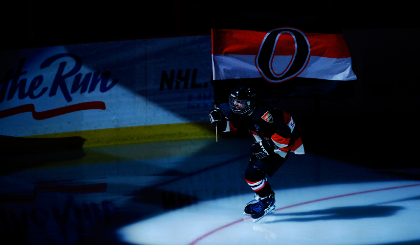OTTAWA, CANADA - December 30: Sens skaters carry the flag before a game between the Capitals and Senators at Canadian Tire Centre on December 30, 2013 in Ottawa, Ontario, Canada. ***** Editorial Use Only *****Jay Kopinski - Icon/SMI