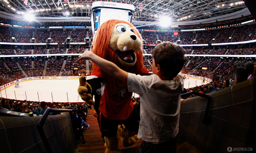OTTAWA, CANADA - April 12:  Spartacat and a young Leaf fan embrace during a game between the Maple Leafs and Senators at Canadian Tire Centre on April 12, 2014 in Ottawa, Ontario, Canada. ***** Editorial Use Only ***** Jay Kopinski - Icon/SMI